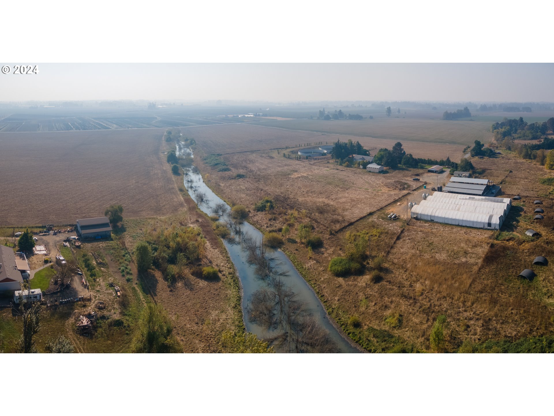 22892 Schultz Road Northeast Aurora, OR 97002 - Photo 7 of 42 a black and white photo of a house