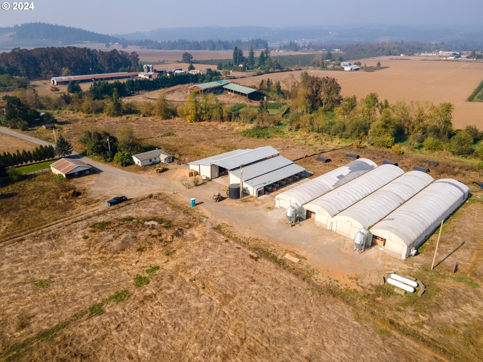 22892 Schultz Road Northeast Aurora, OR 97002 - Photo 9 of 42 an aerial view of residential houses with outdoor space