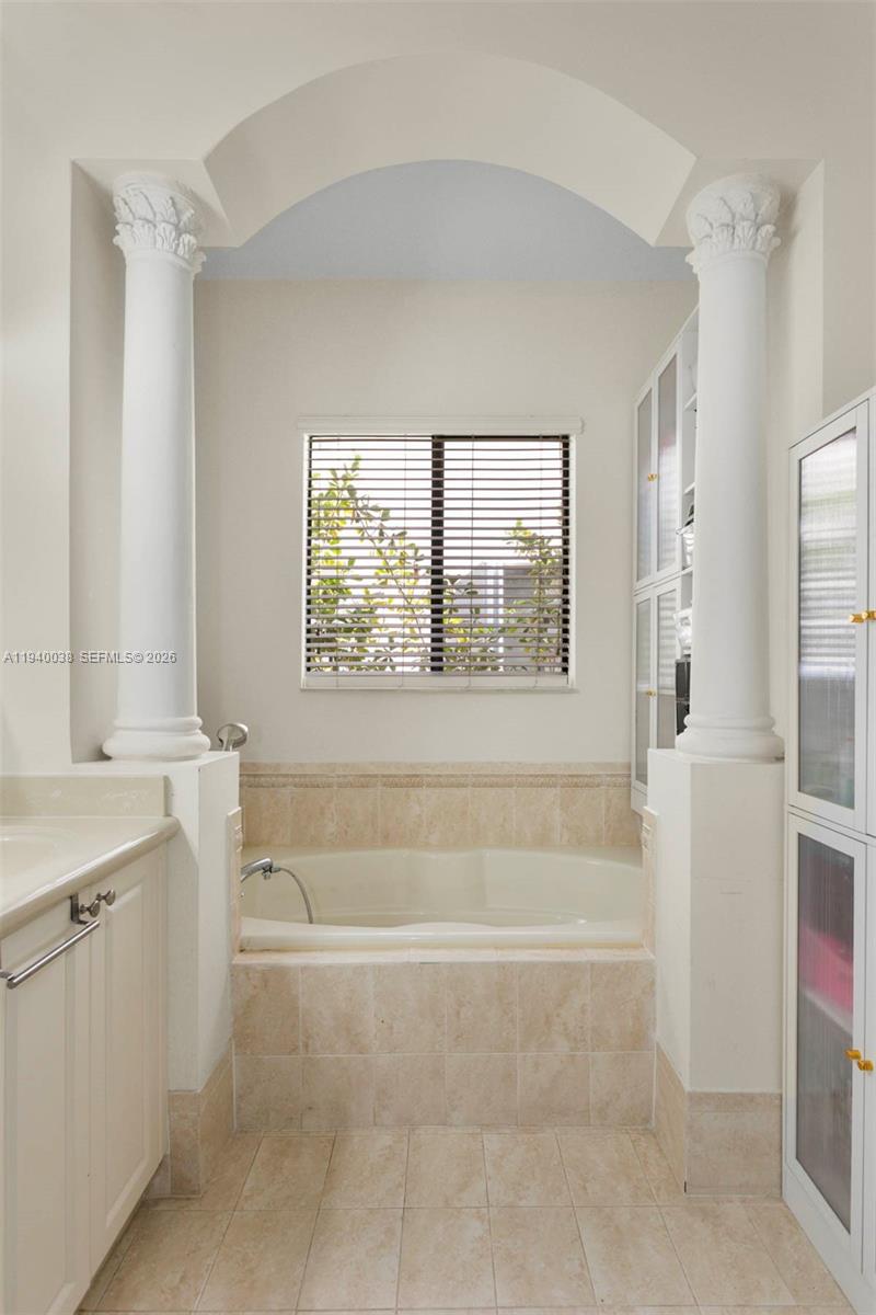 7666 Southwest 193rd Lane Cutler Bay, FL 33157 - Photo 23 of 45 a spacious bathroom with a bathtub and a shower