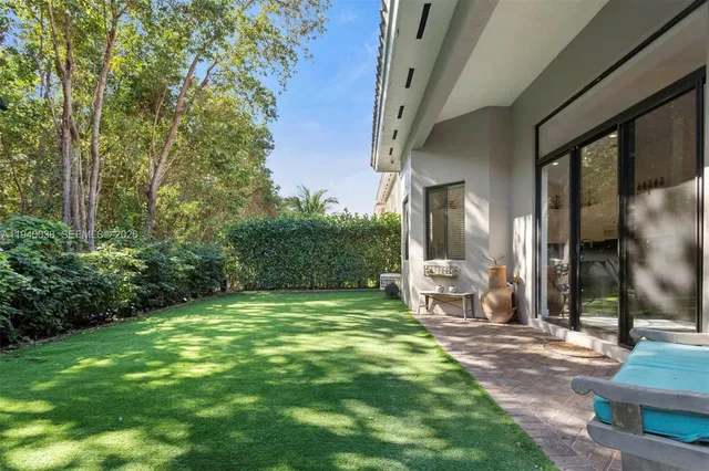 a view of a back yard of the house