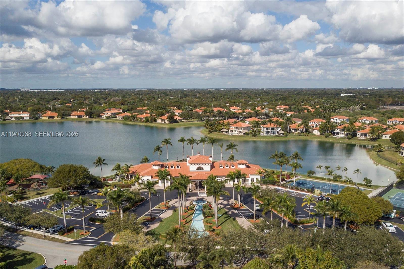 7666 Southwest 193rd Lane Cutler Bay, FL 33157 - Photo 38 of 45 an aerial view of lake and houses with outdoor space