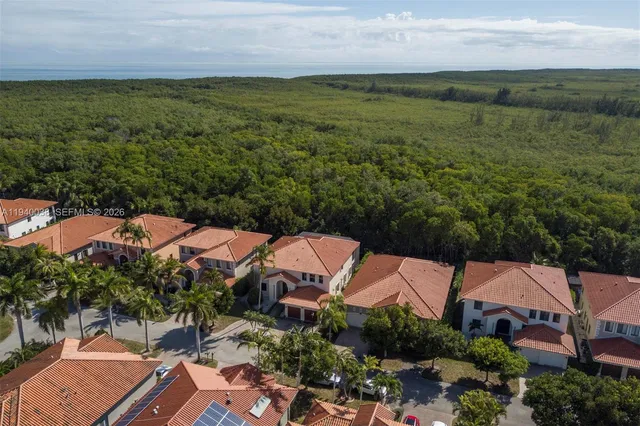 an aerial view of a house with a garden