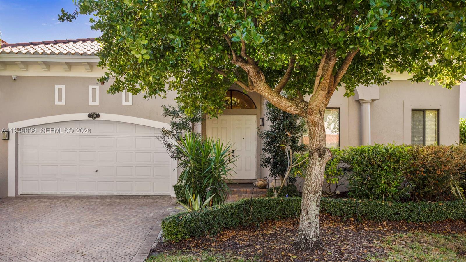 7666 Southwest 193rd Lane Cutler Bay, FL 33157 - Photo 4 of 45 a view of a house with a tree
