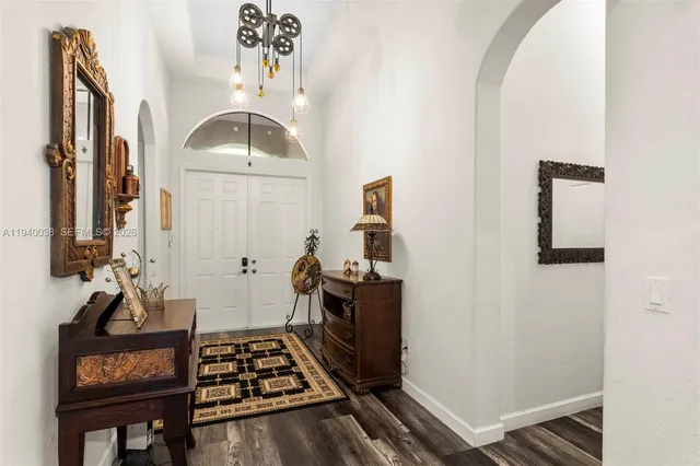 a room with furniture and wooden floor