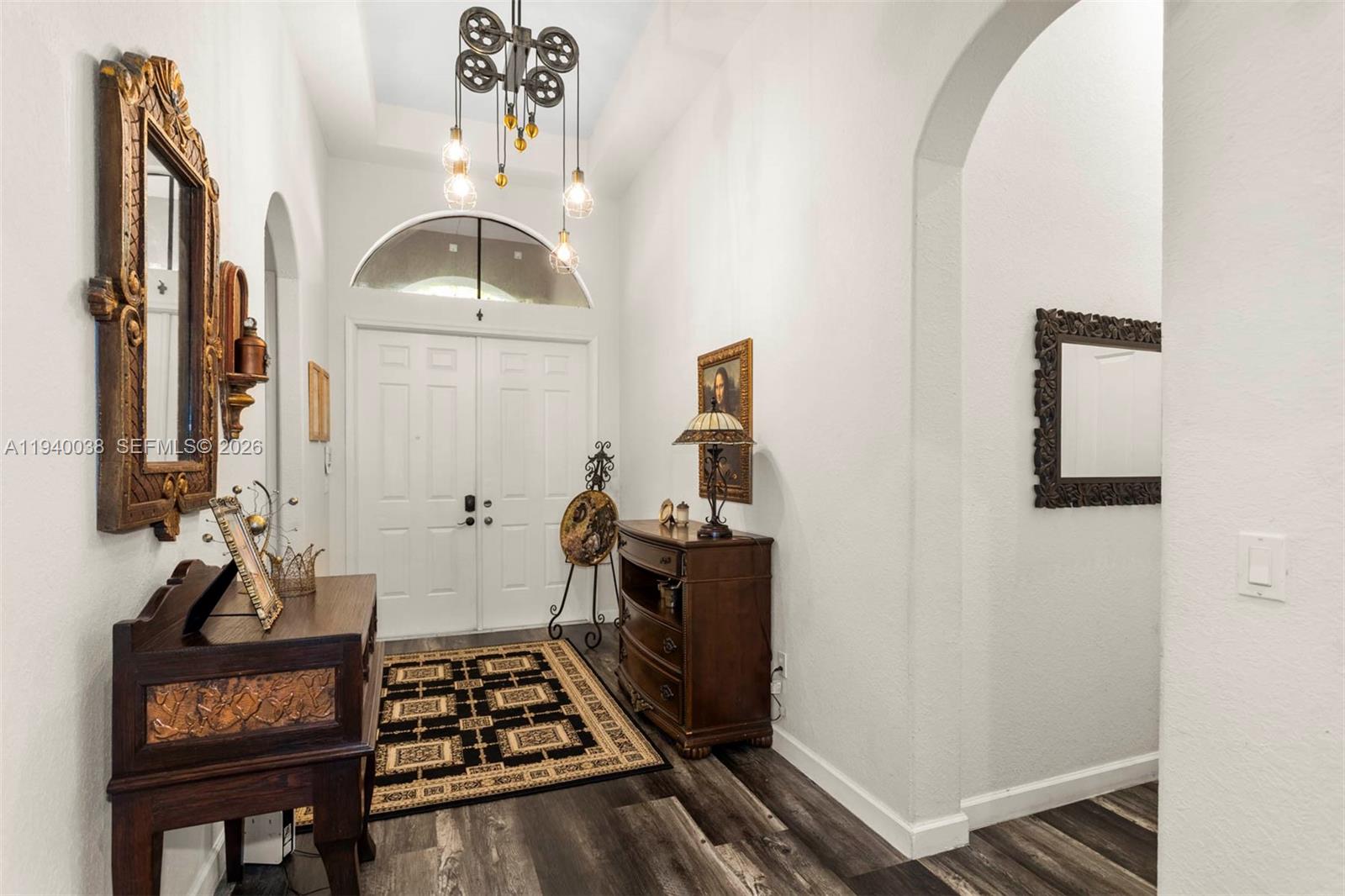 7666 Southwest 193rd Lane Cutler Bay, FL 33157 - Photo 7 of 45 a room with furniture and wooden floor