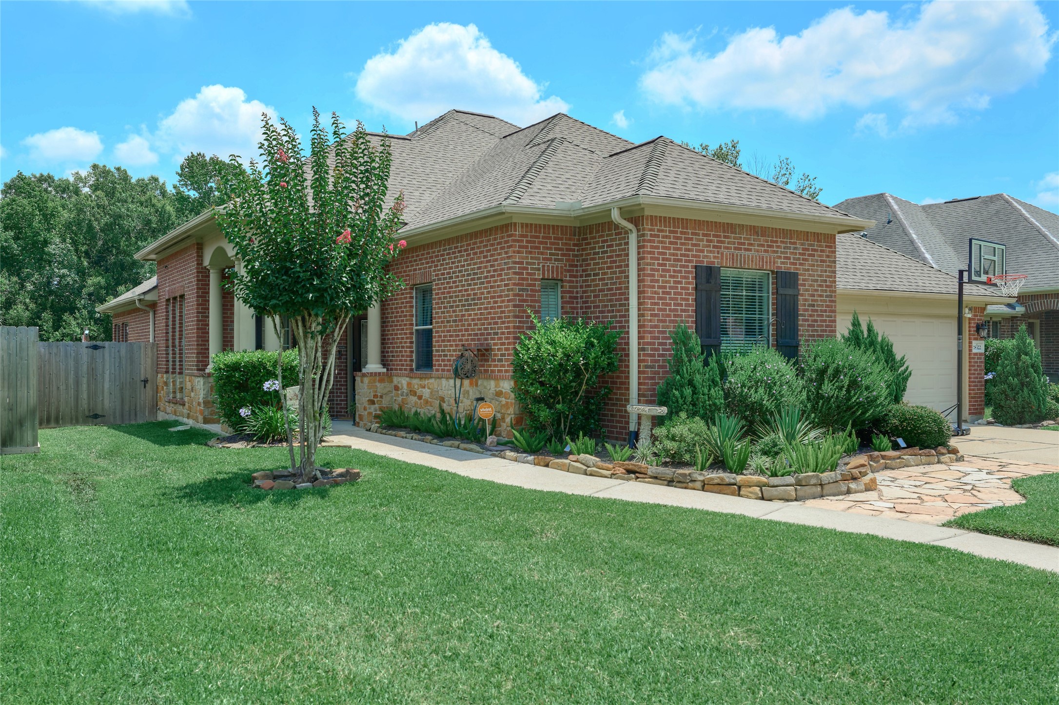 28322 Madelin Manor Lane Spring, TX 77386 - Photo 3 of 46 a view of a house with a yard and plants