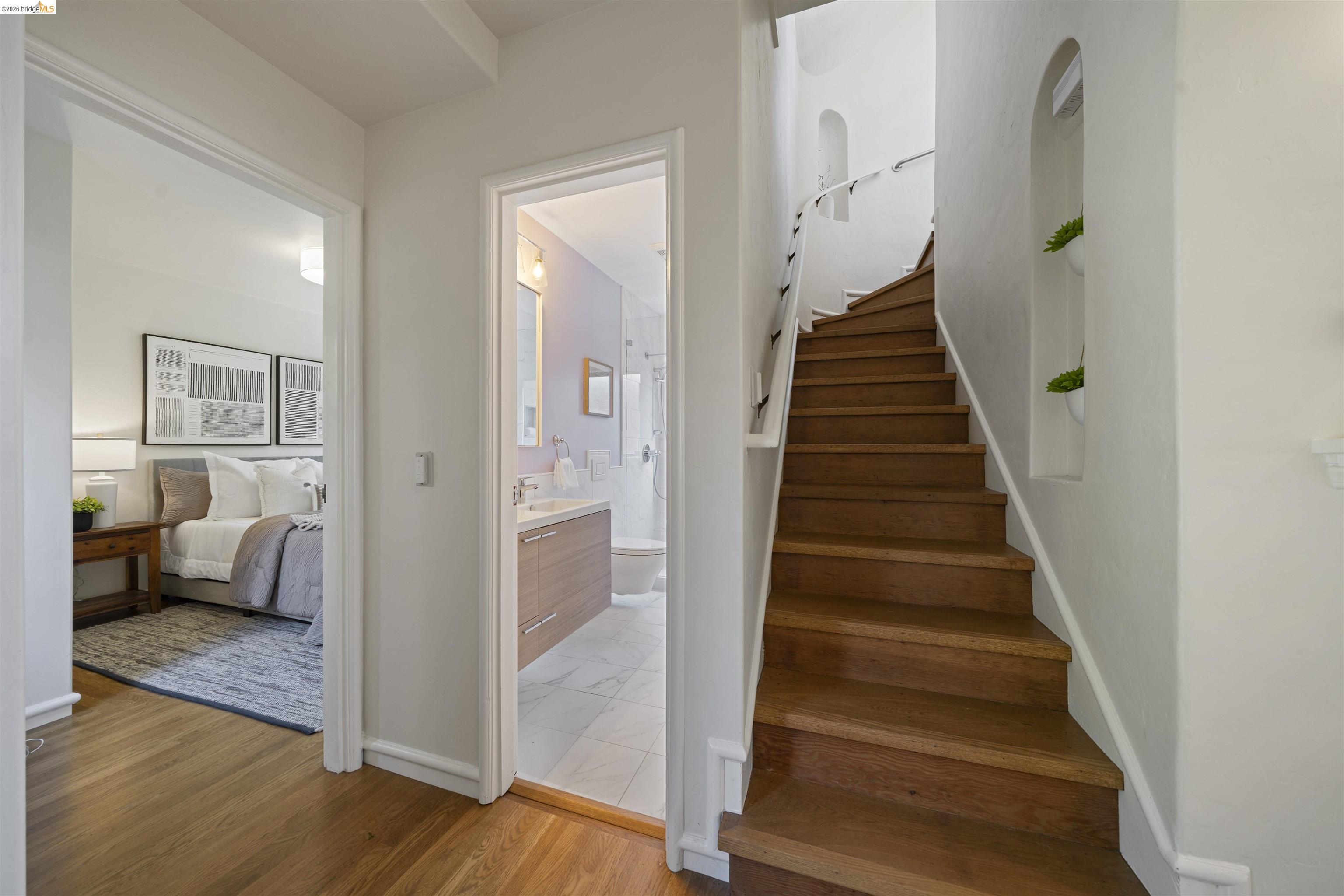 1170 Sterling Avenue Berkeley, CA 94708 - Photo 24 of 52 Stairway with wood finished floors and baseboards