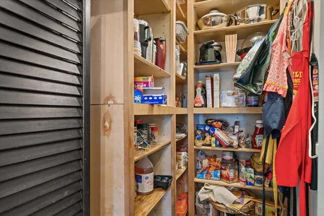 a view of a livingroom with furniture and wooden floor
