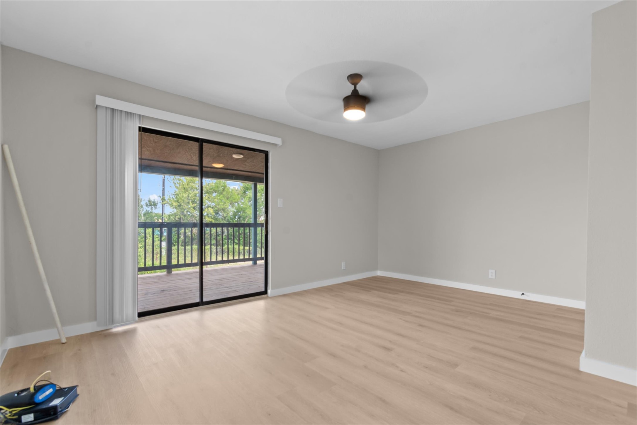 9100 Highway 183 Austin, TX 78747 - Photo 23 of 38 Sliding glass doors open directly to a private back deck.