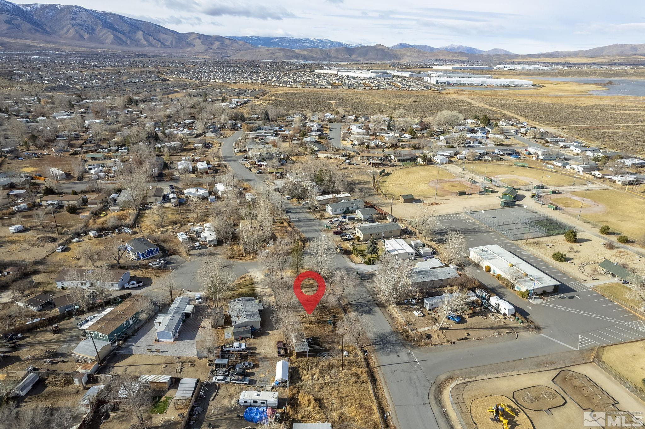 330 Prestige Court, Unit 101 Reno, NV 89506 - Photo 12 of 17 an aerial view of residential building and lake view