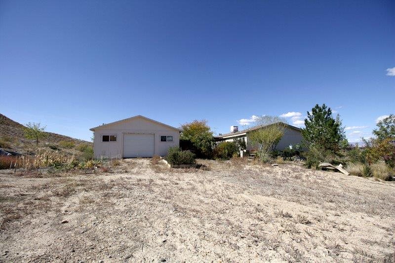 1679 O Road Loma, CO 81524 - Photo 21 of 34 a view of a house with a yard