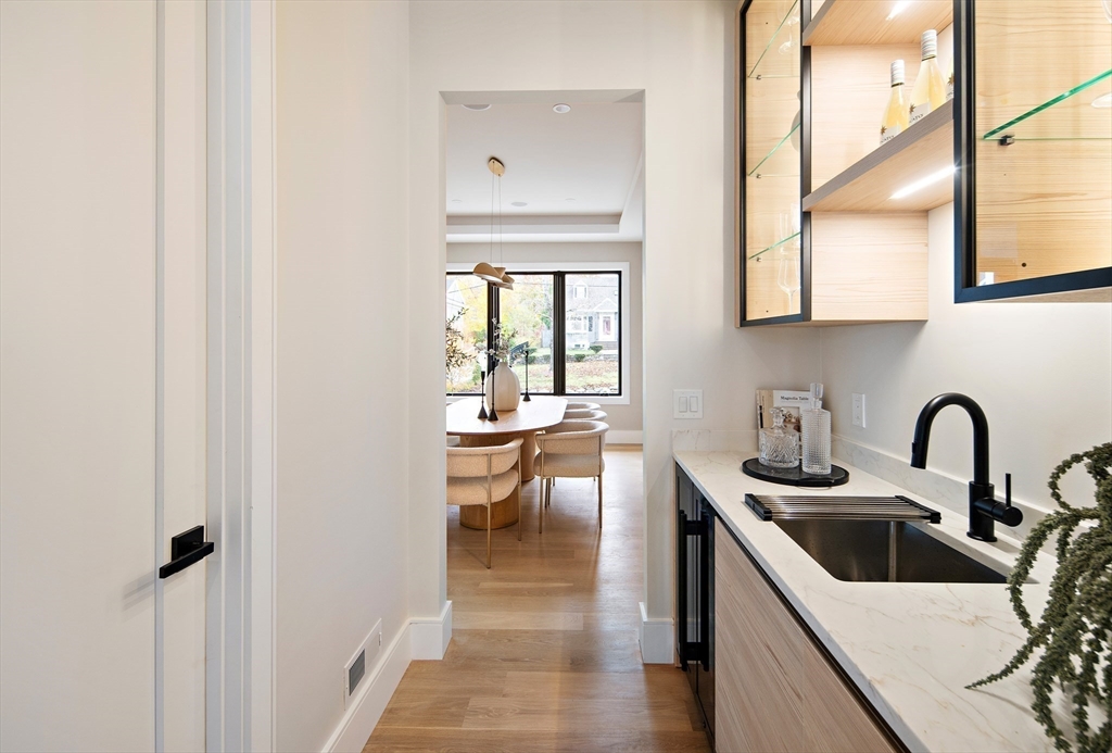 34 Pershing Road Needham, MA 02494 - Photo 11 of 41 a kitchen with a sink and a stove top oven