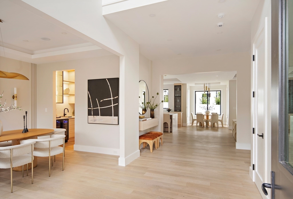 34 Pershing Road Needham, MA 02494 - Photo 14 of 41 a living room with furniture and a flat screen tv