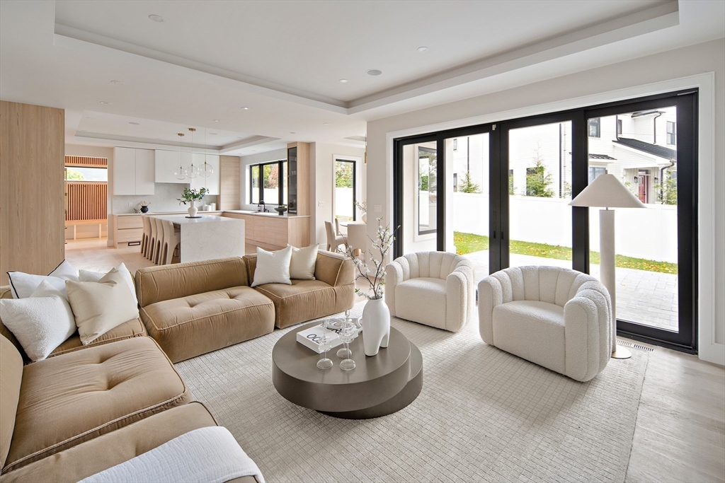 34 Pershing Road Needham, MA 02494 - Photo 15 of 41 a living room with furniture and a large window