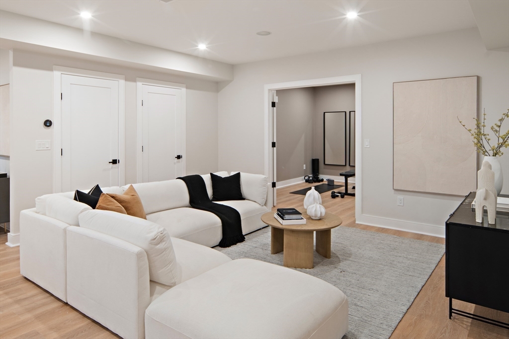 34 Pershing Road Needham, MA 02494 - Photo 30 of 41 a room with furniture and wooden floor