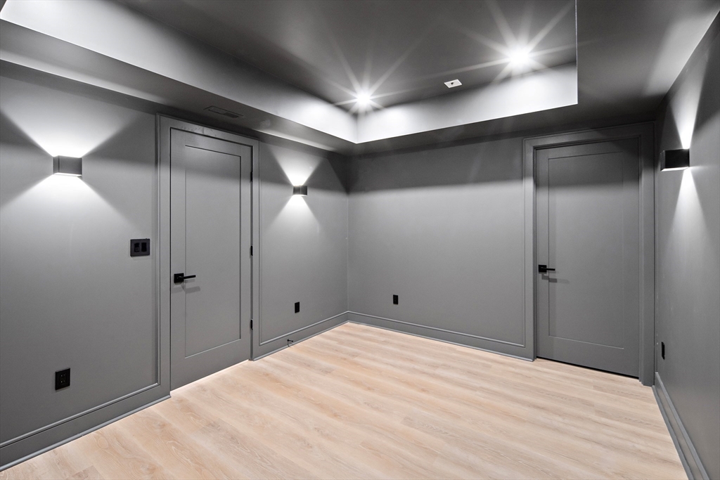 34 Pershing Road Needham, MA 02494 - Photo 35 of 41 a bathroom with a shower and a shower