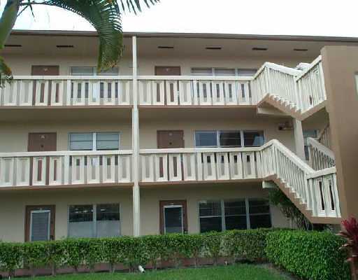 44 Suffolk B, Unit 44 Boca Raton, FL 33434 - Photo 1 of 1 front view of a house with a lots of windows