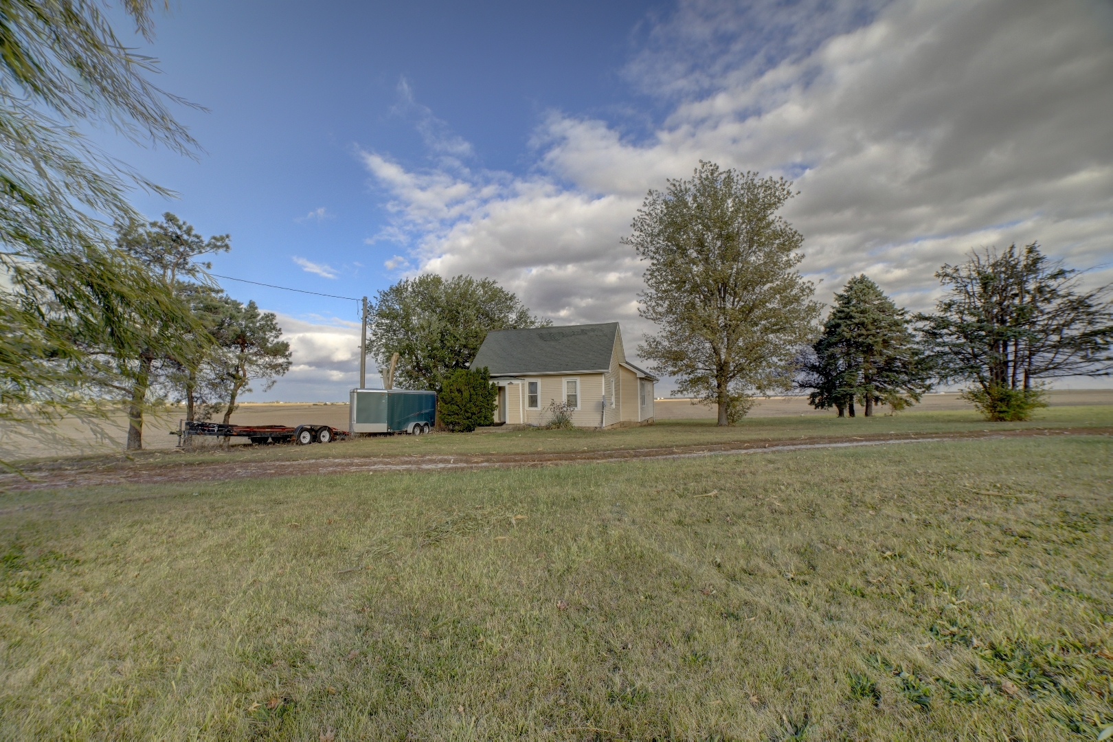 2018 Highway 45 Gilman, IL 60938 - Photo 1 of 16 a view of a field with trees