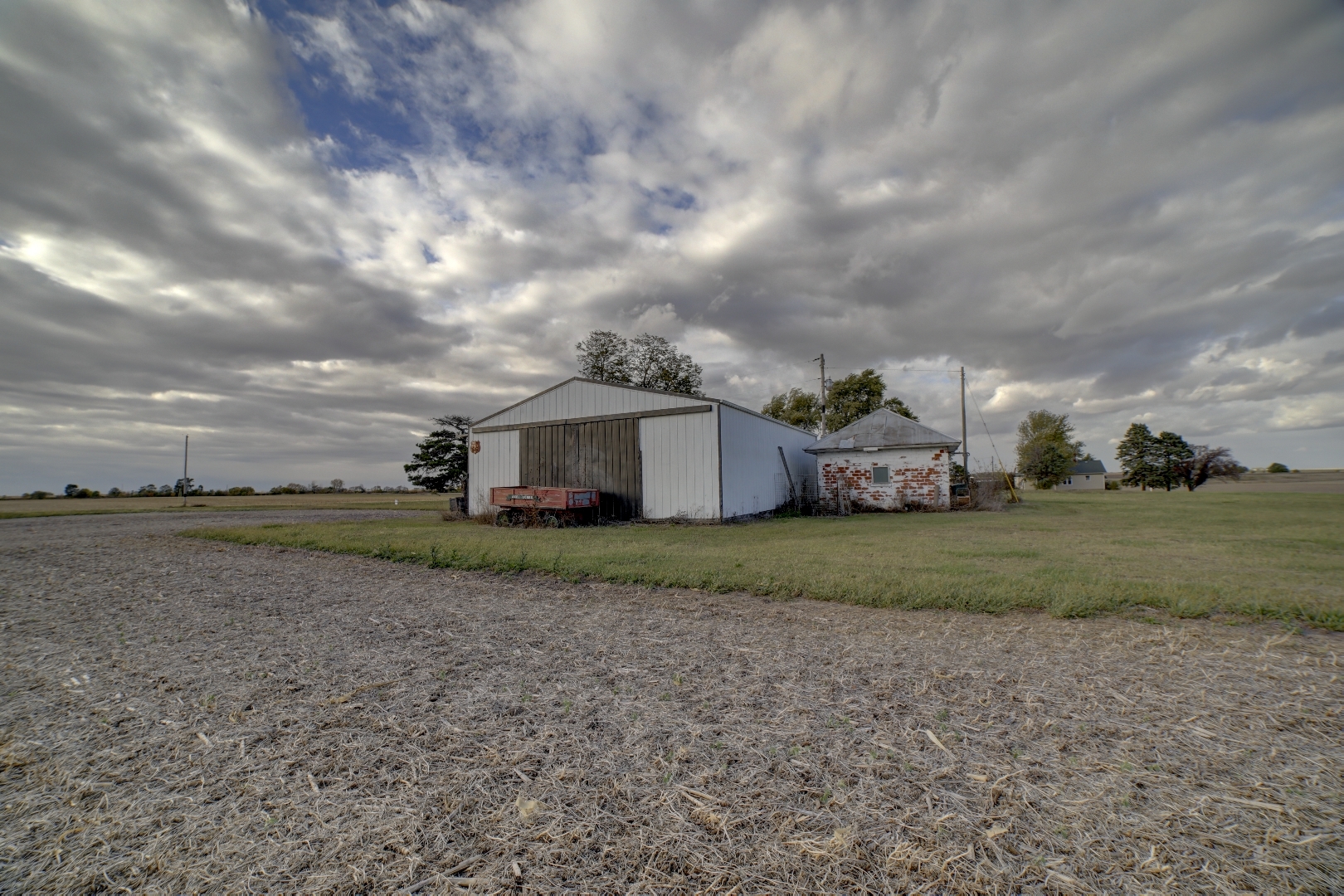 2018 Highway 45 Gilman, IL 60938 - Photo 13 of 16 a view of a house with a back yard