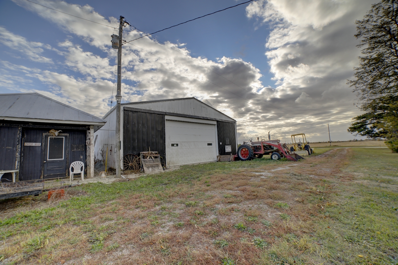 2018 Highway 45 Gilman, IL 60938 - Photo 14 of 16 a view of a house with backyard
