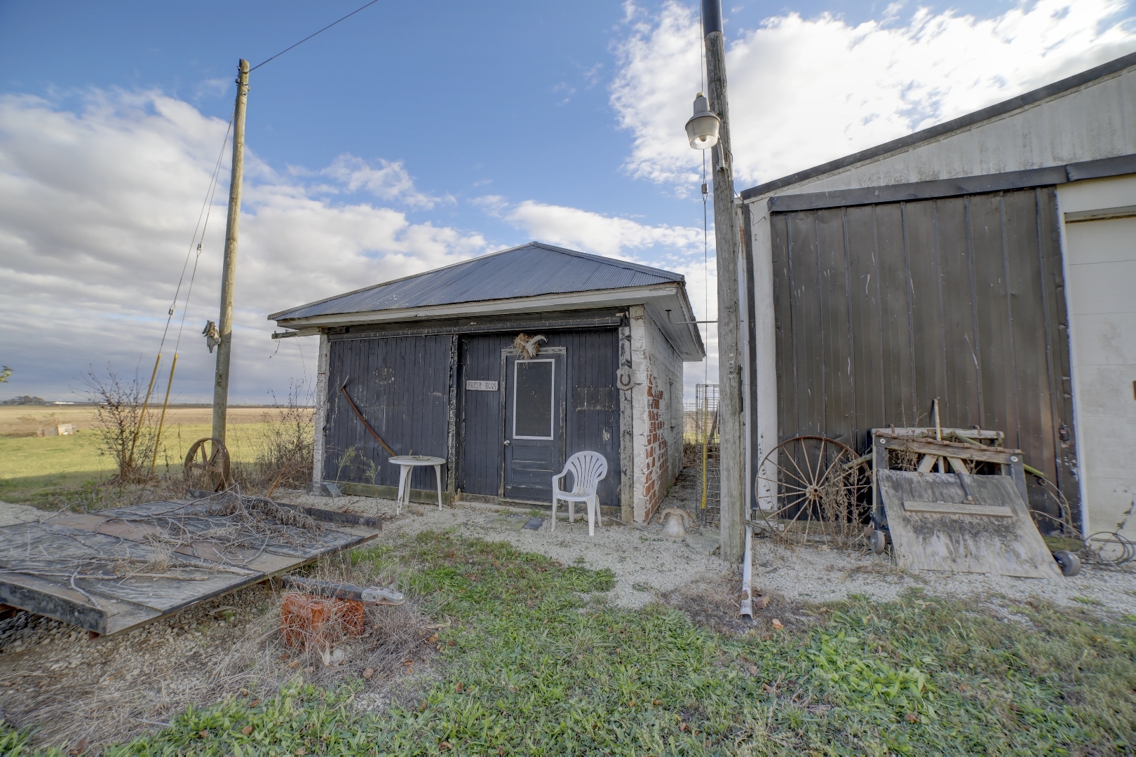 2018 Highway 45 Gilman, IL 60938 - Photo 8 of 16 a house view with a backyard space
