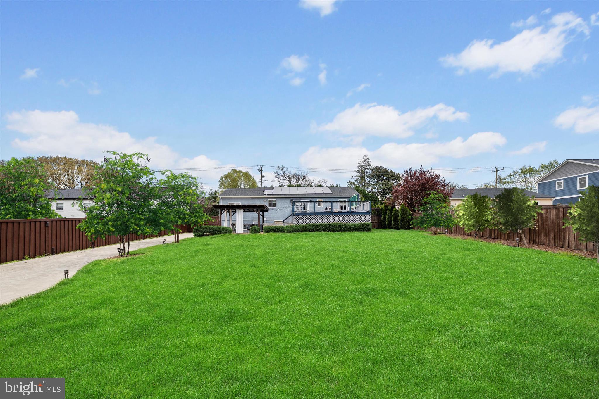 3206 North Glebe Road Arlington, VA 22207 - Photo 20 of 20 a view of a garden with a building in the background