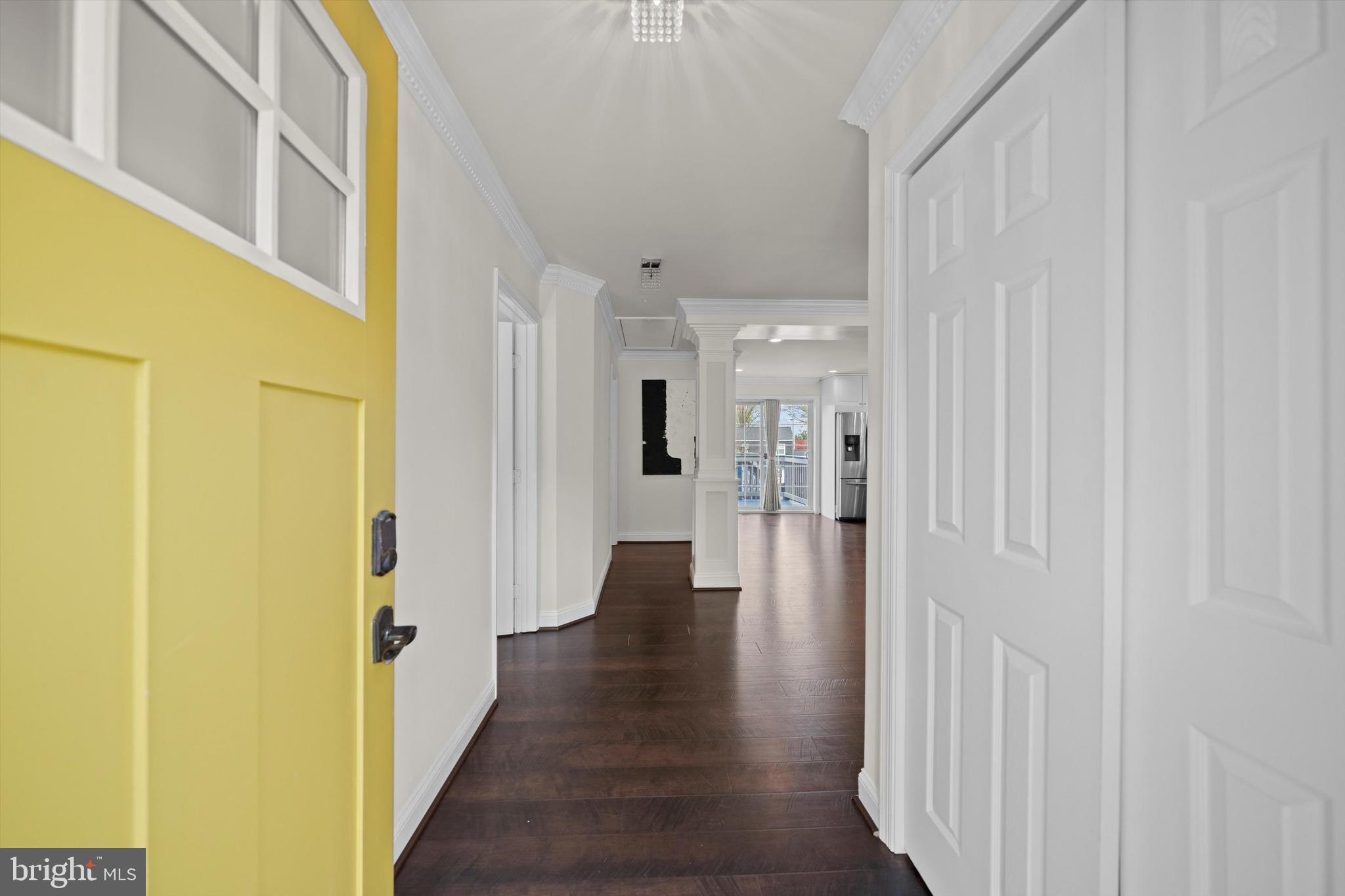 3206 North Glebe Road Arlington, VA 22207 - Photo 3 of 20 a view of a hallway with wooden floor and closet