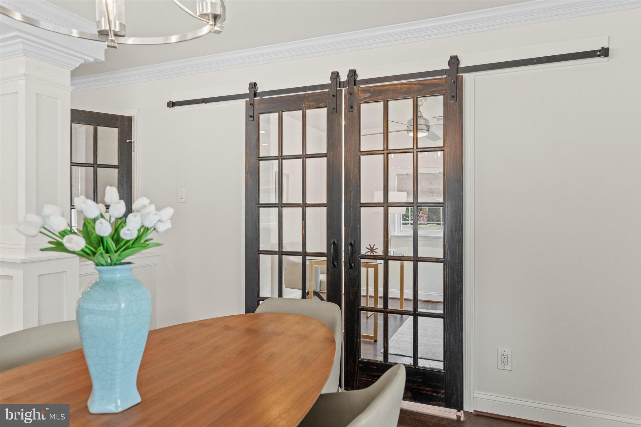 3206 North Glebe Road Arlington, VA 22207 - Photo 8 of 20 a view of a balcony with chair and wooden floor