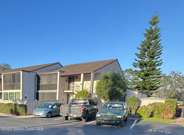 a car parked in front of a house