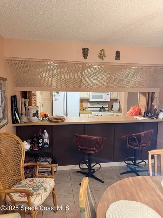 a bedroom with a bed and cabinets