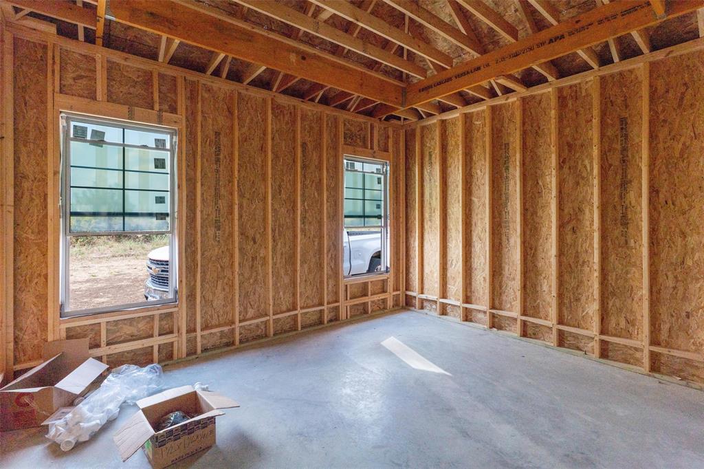 1405 Red Rock Road Hewitt, TX 76643 - Photo 6 of 25 New construction with exposed wooden wall studs and roof trusses