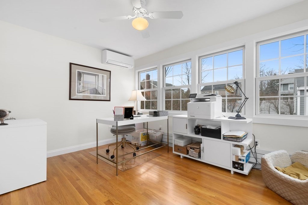 10 Standish Road Milton, MA 02186 - Photo 13 of 28 a view of a workspace with furniture and a window