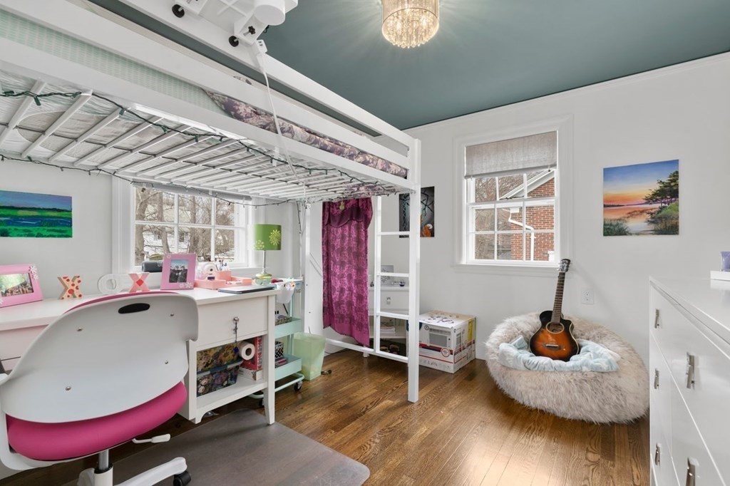 10 Standish Road Milton, MA 02186 - Photo 18 of 28 a view of a room with furniture and a window