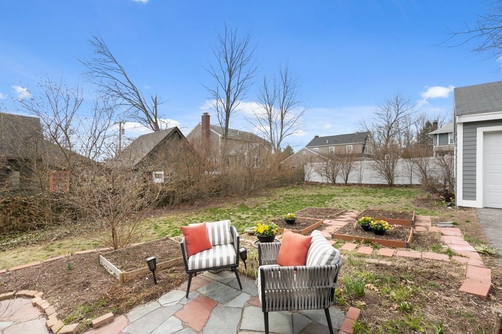 10 Standish Road Milton, MA 02186 - Photo 24 of 28 a view of backyard with seating area and barbeque oven