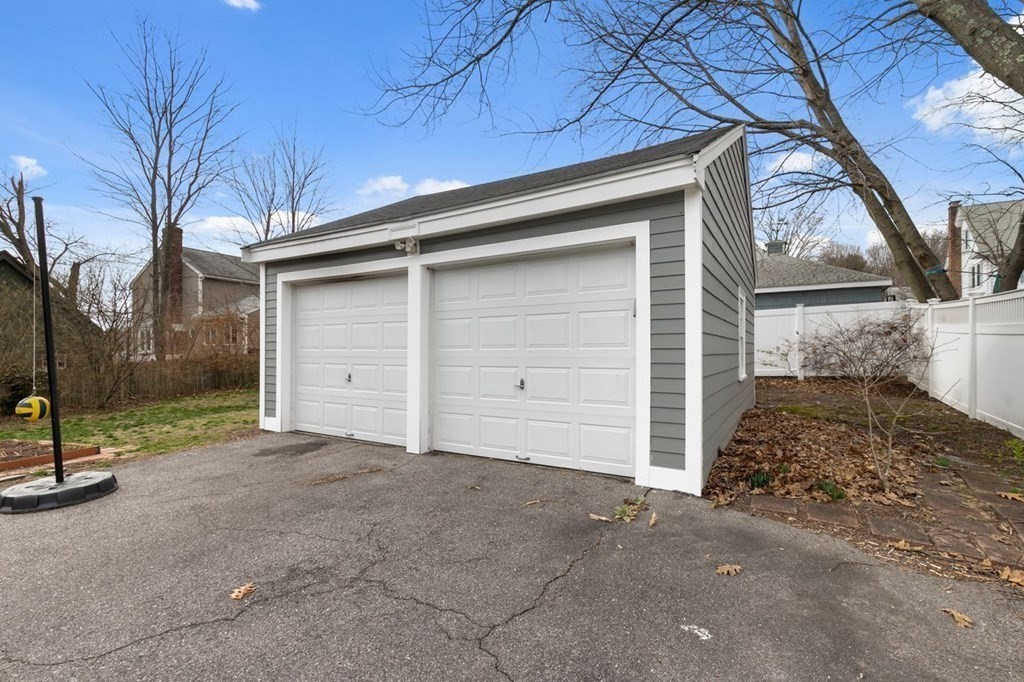 10 Standish Road Milton, MA 02186 - Photo 25 of 28 a view of a house with a garage
