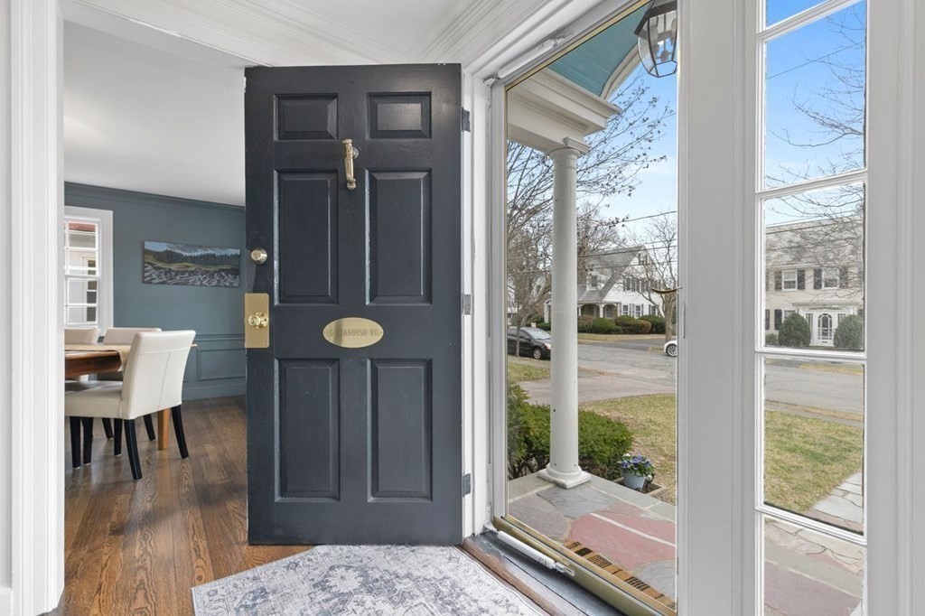 10 Standish Road Milton, MA 02186 - Photo 3 of 28 a very nice looking room with a large window and wooden floor