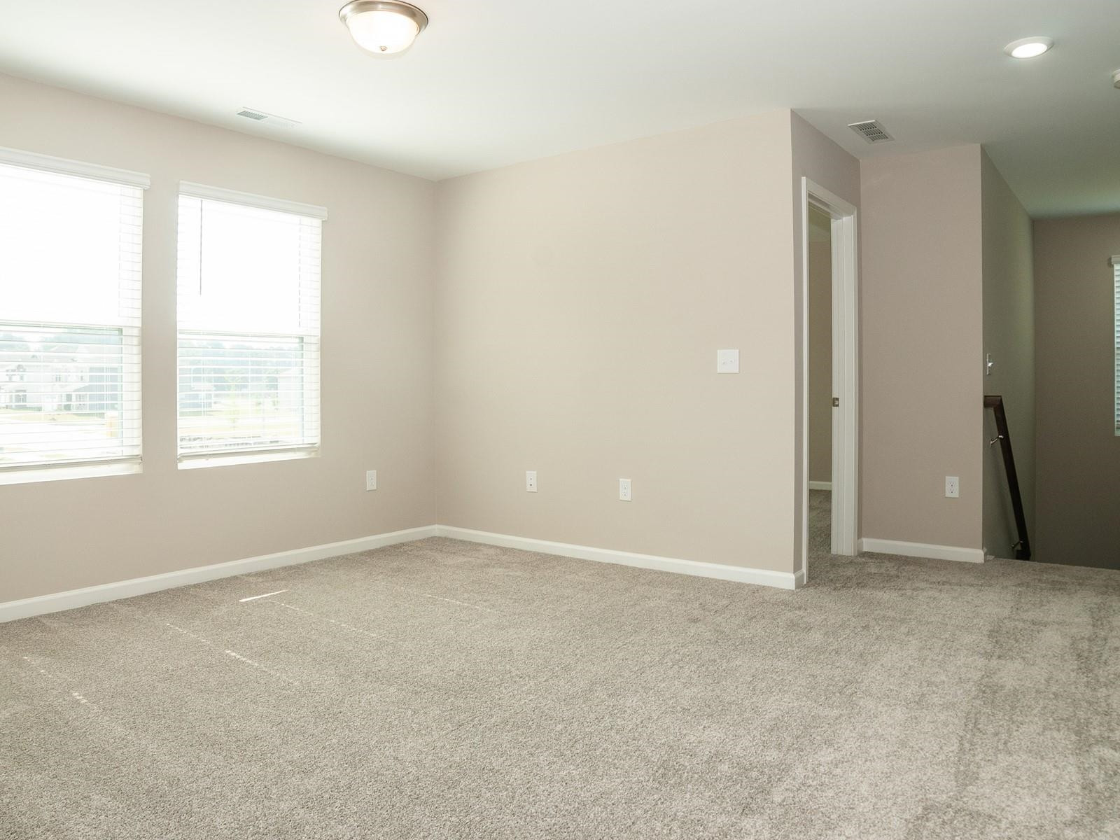 4001 Mountjoy Trail Raleigh, NC 27616 - Photo 50 of 59 an empty room with windows and closet
