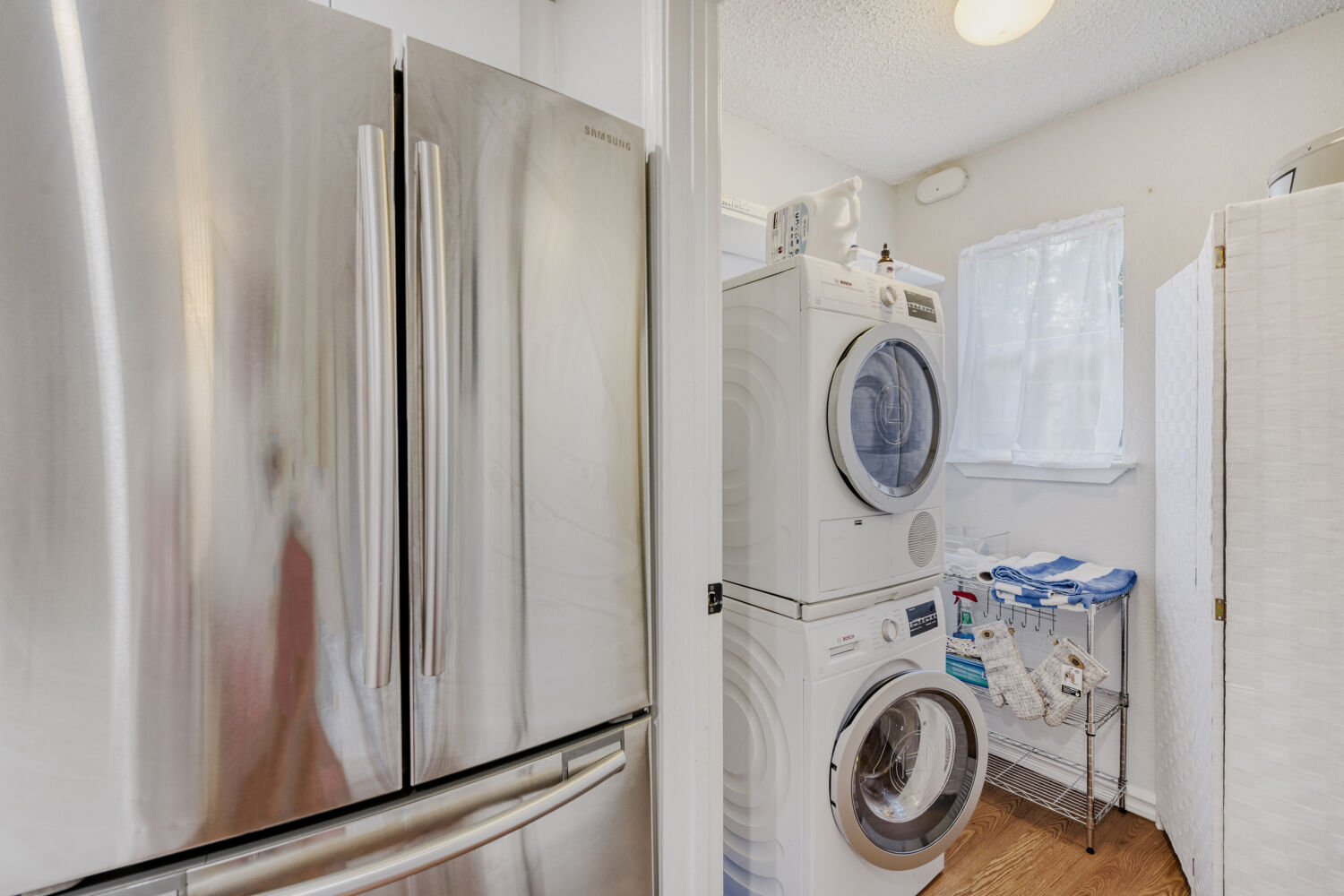 1912 Lightsey Road, Unit 6 Austin, TX 78704 - Photo 22 of 27 a view of storage and utility room with washer and dryer