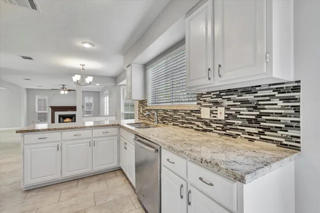 a view of a bathroom from a hallway