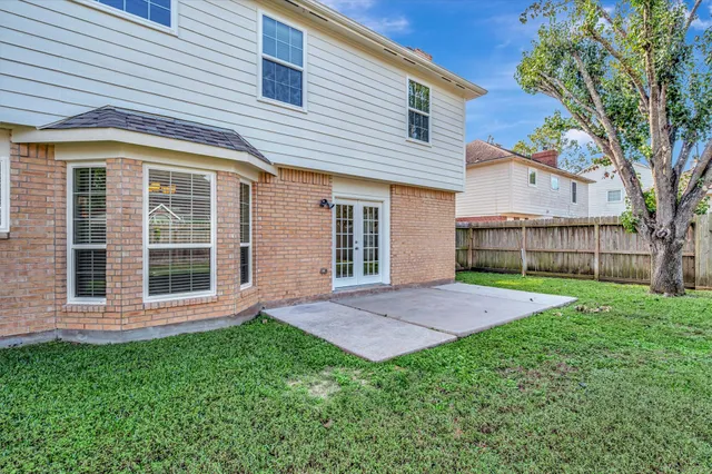 a view of outdoor space yard and front view of a house