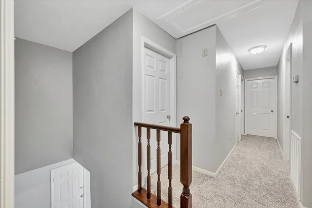 a bathroom with a granite countertop sink mirror toilet and bathtub