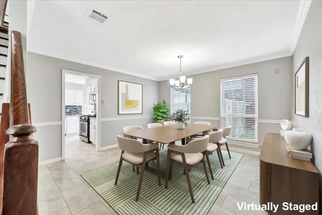a view of a dining room with furniture