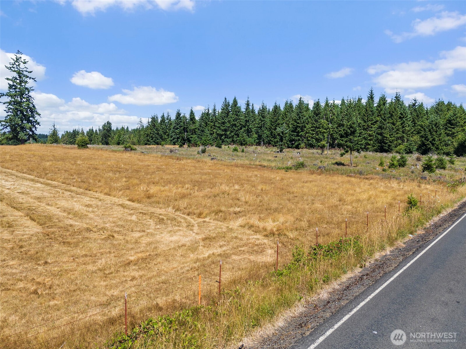 0 Frogner Road, Unit 3 Chehalis, WA 98532 - Photo 7 of 15 a view of a yard with an outdoor space and seating area