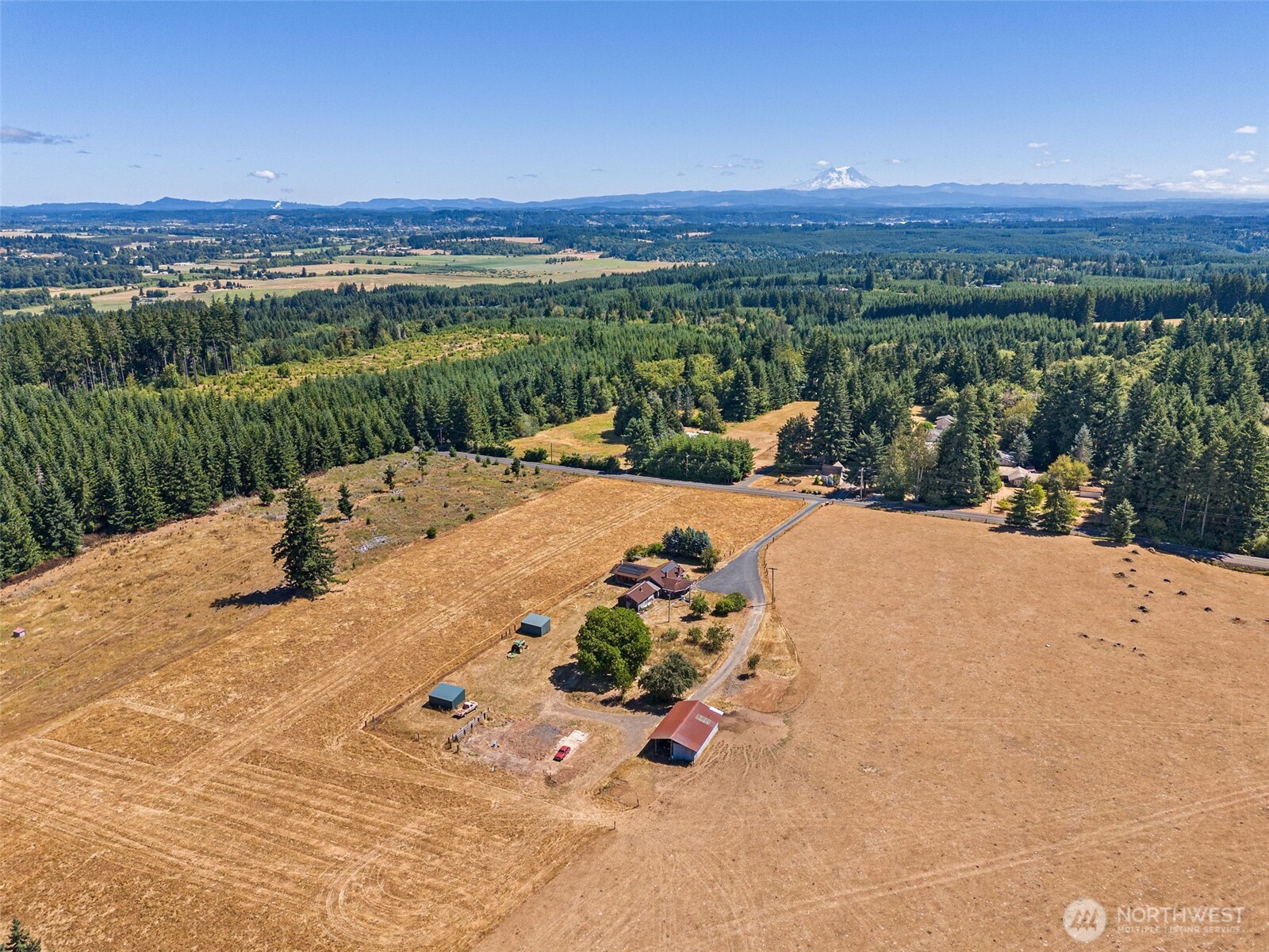 0 Frogner Road, Unit 3 Chehalis, WA 98532 - Photo 9 of 15 a view of a terrace with a garden and mountain view