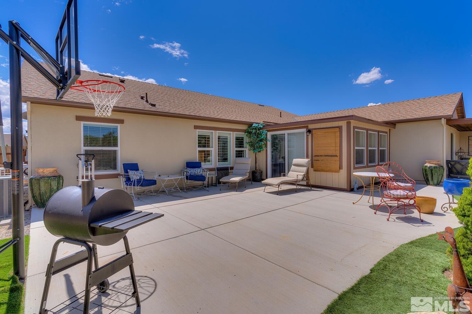148 Carson River Drive Dayton, NV 89403 - Photo 14 of 31 a outdoor space with furniture and potted plants