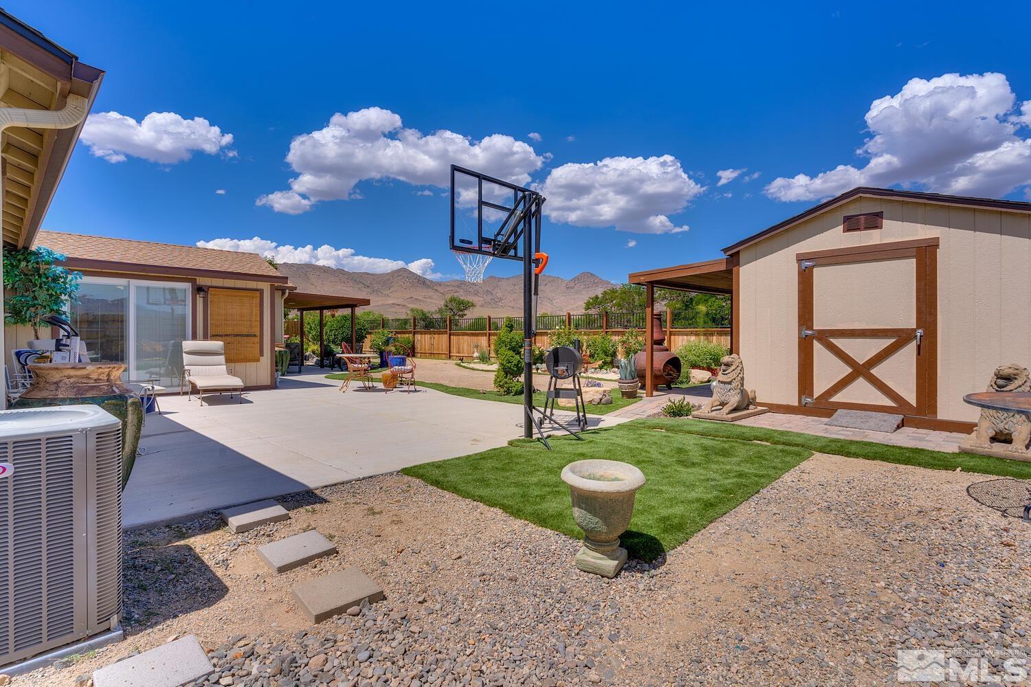 148 Carson River Drive Dayton, NV 89403 - Photo 15 of 31 a view of a backyard with sitting area