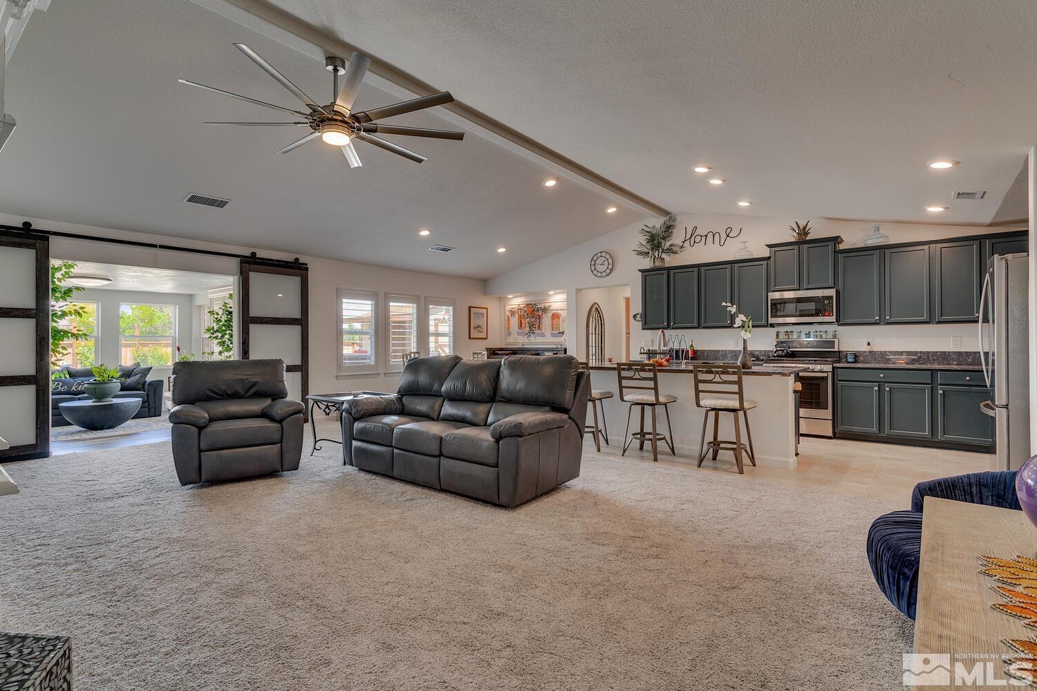 148 Carson River Drive Dayton, NV 89403 - Photo 3 of 31 a living room with furniture and kitchen view
