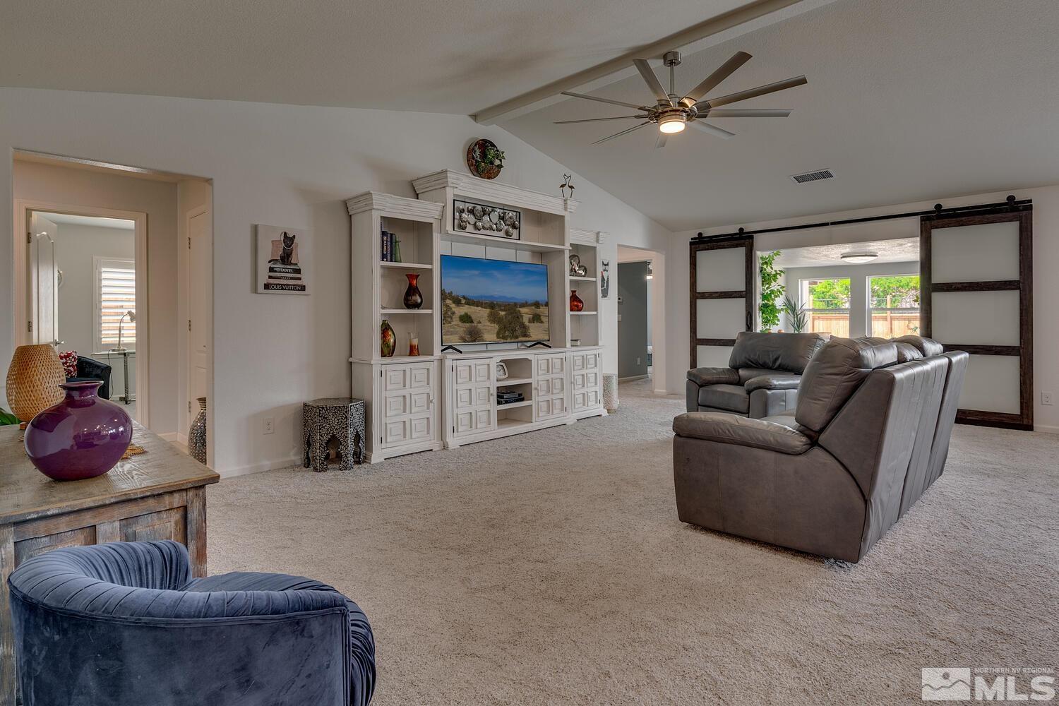 148 Carson River Drive Dayton, NV 89403 - Photo 4 of 31 a living room with furniture and a large window