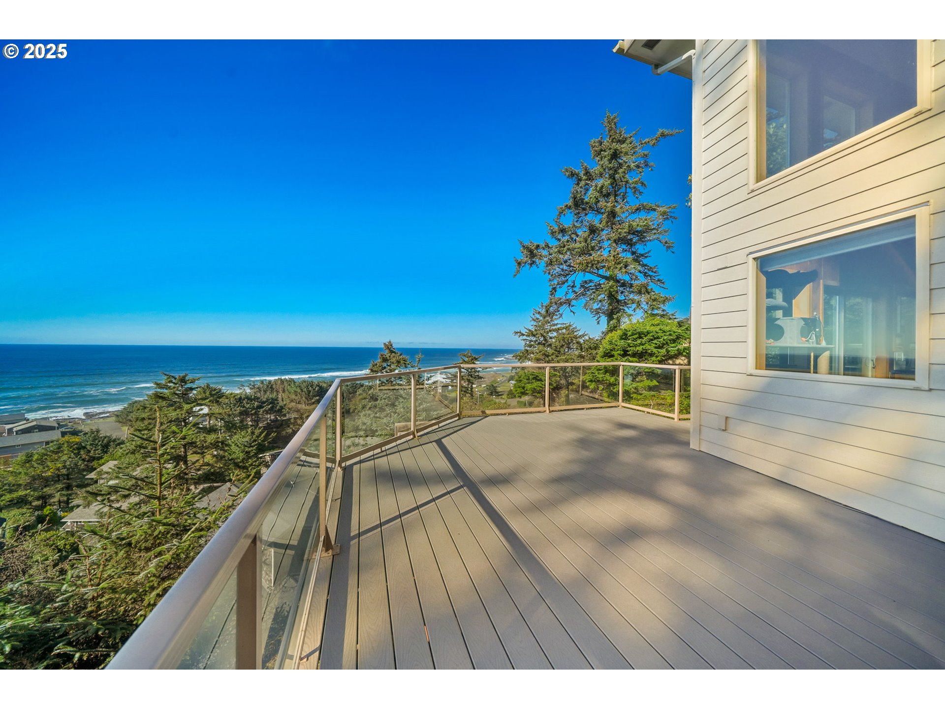 a view of a balcony with an ocean view