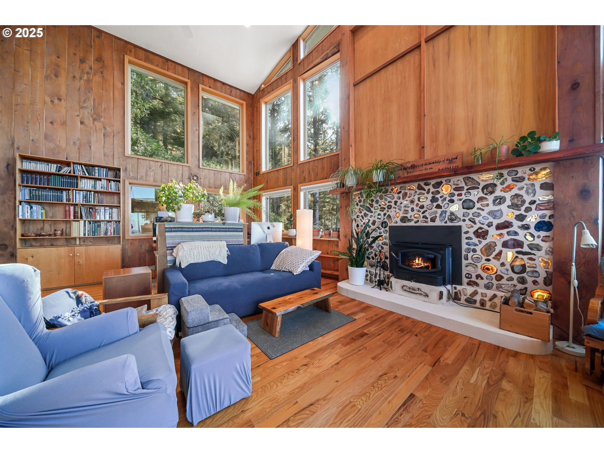 674 Pacific View Drive Yachats, OR 97498 - Photo 14 of 47 a living room with furniture and a fireplace